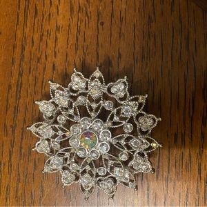 Silver flower brooch